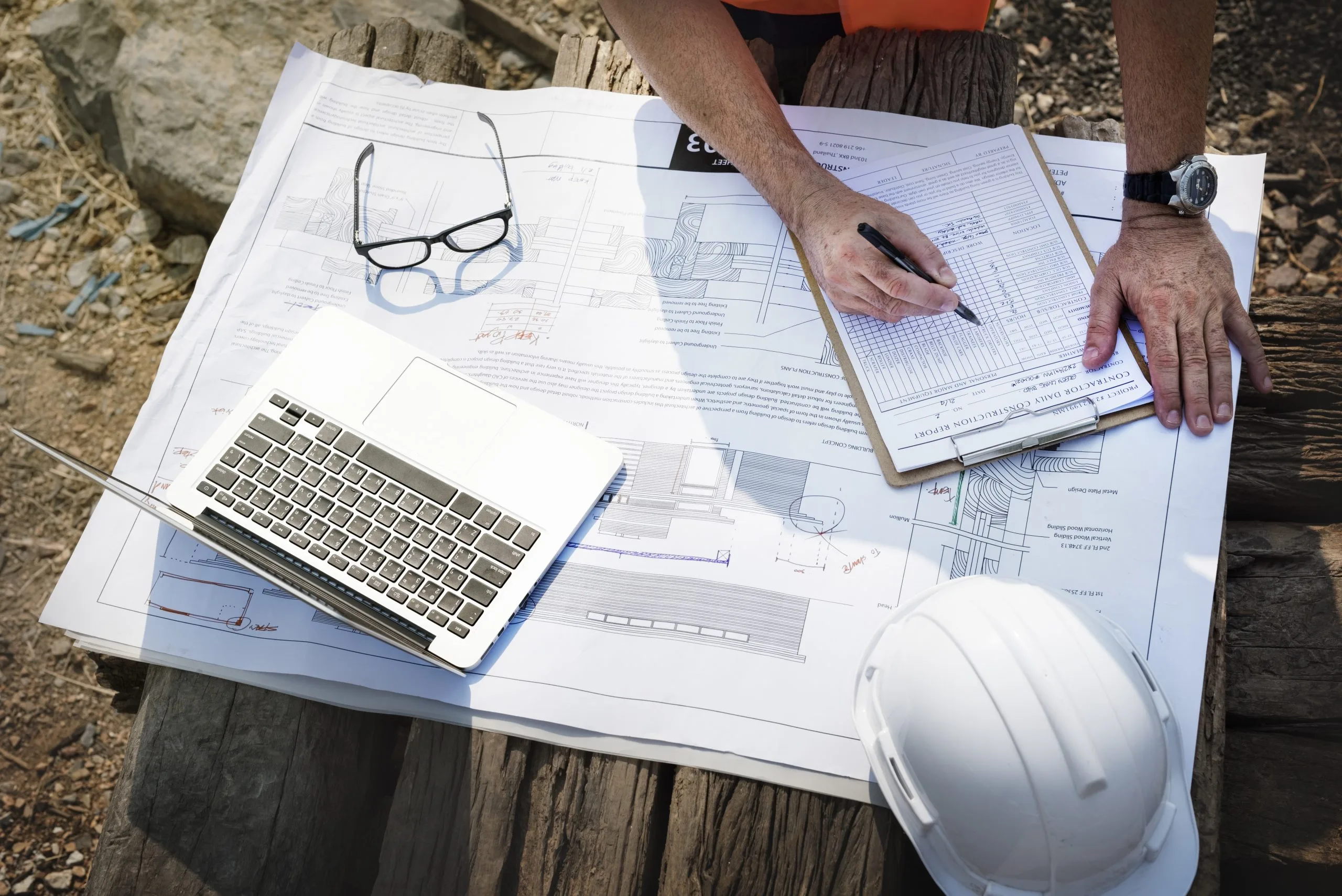 Construction site monitored by project professionals